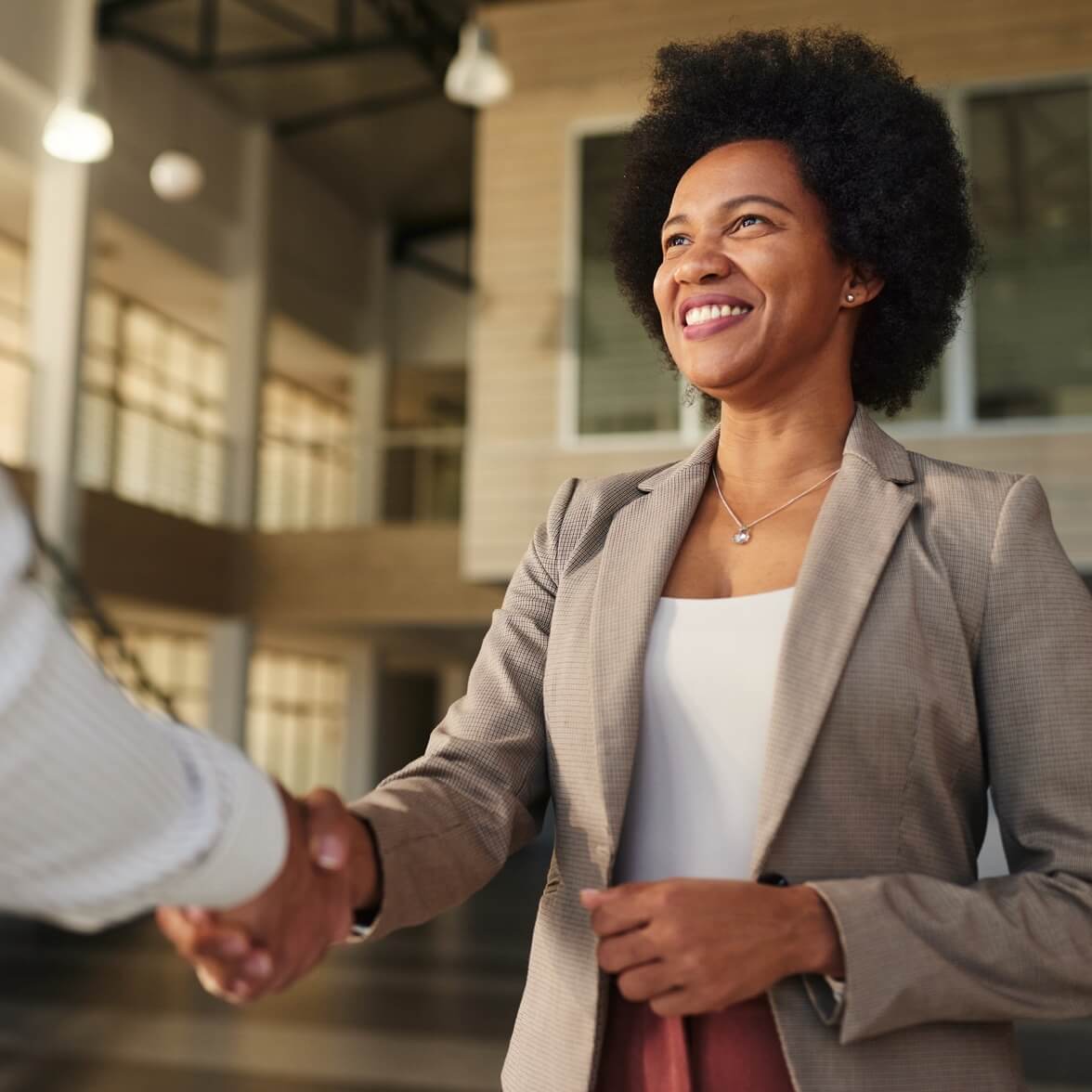 black businesswoman shaking hands