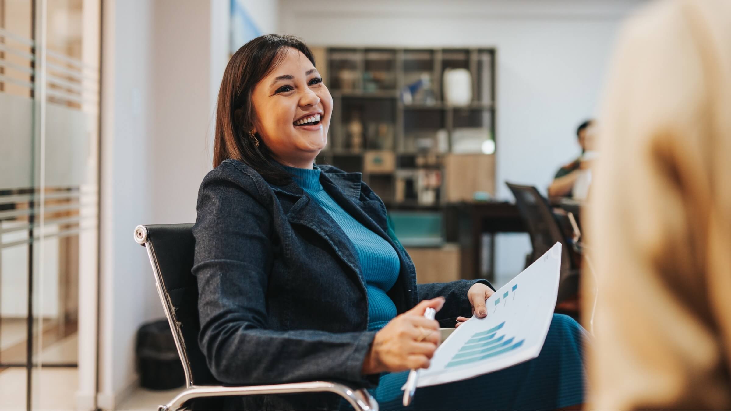 smiling businesswoman interacting header@2x