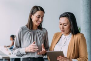 business coach advises business person at Maryland non profit office