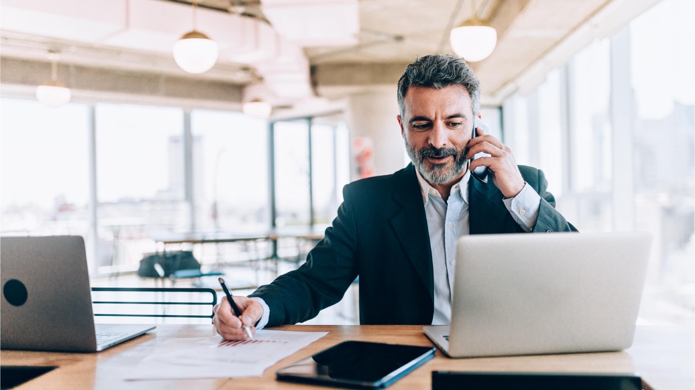 businessman at office talking phone header