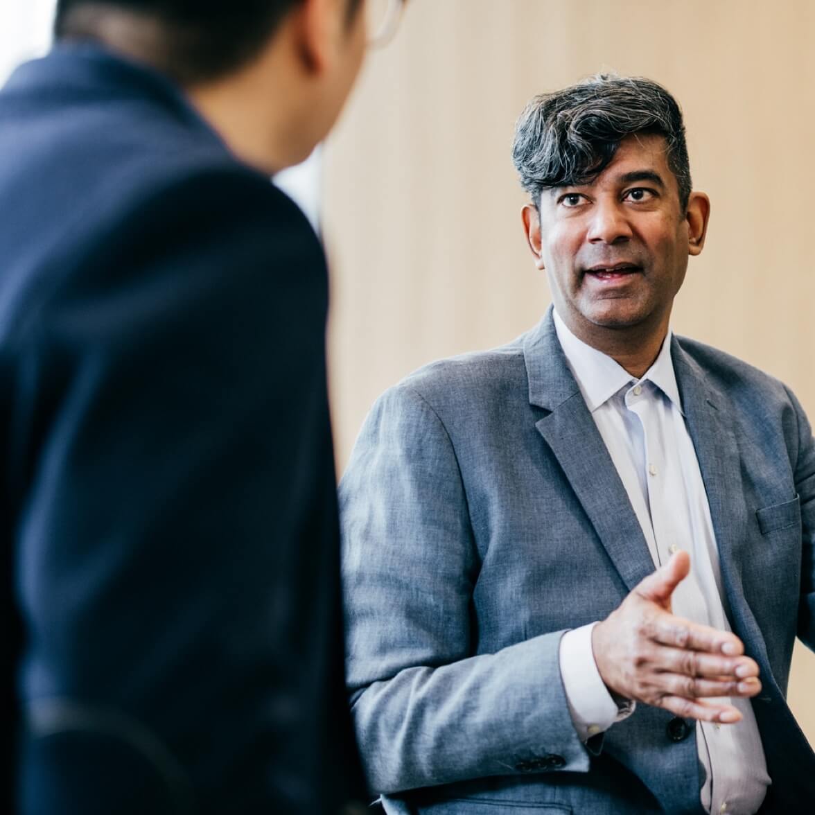 two men discussing finances feature two men discussing finances feature