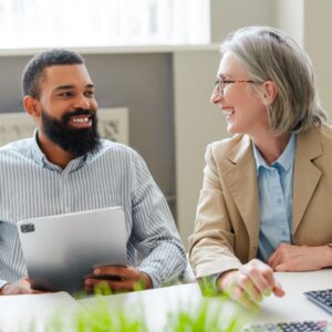clients in office discuss applying business strategy from HeimLantz CPA