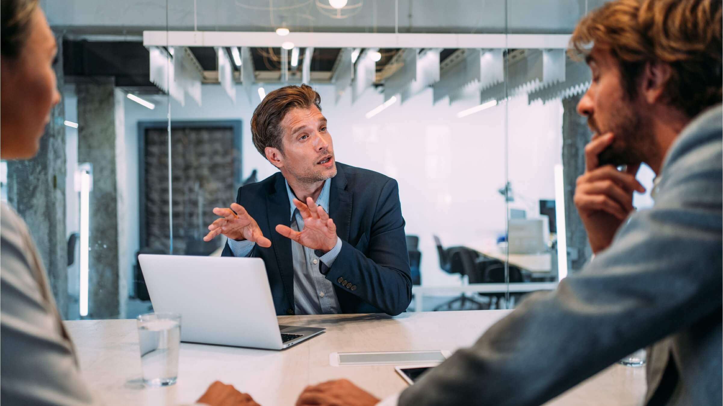 colleagues discussing finances header