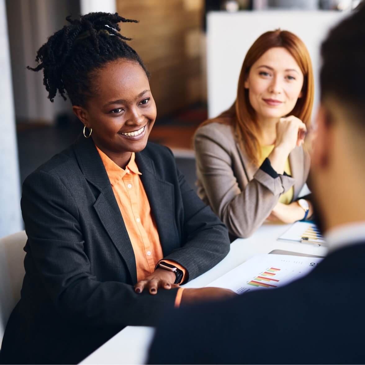 two women consulting on finances feature two women consulting on finances feature
