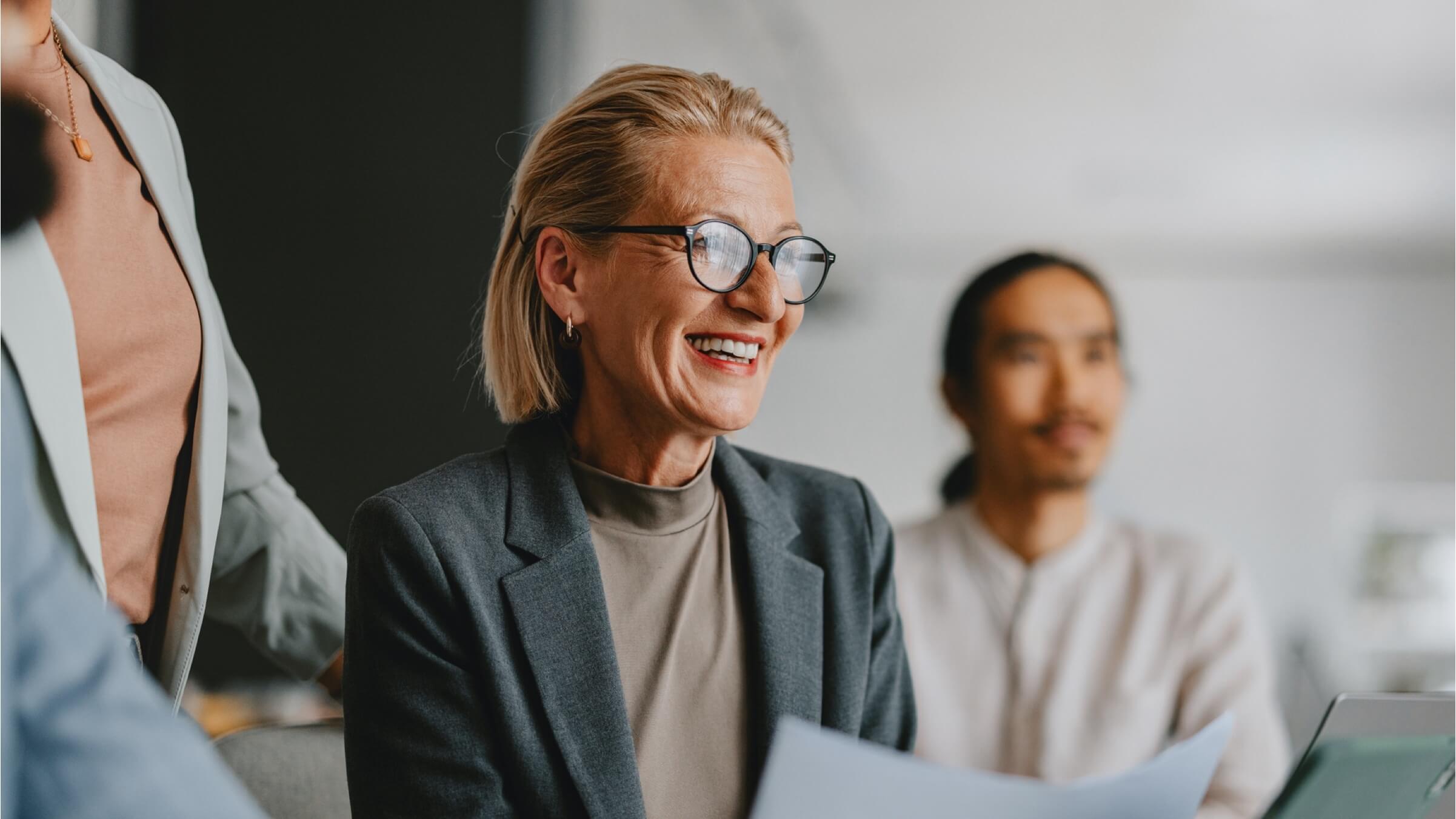 senior businesswoman leading team header
