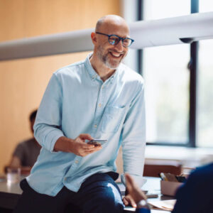 smiling man receiving strategic financial advice from Maryland accounting firm