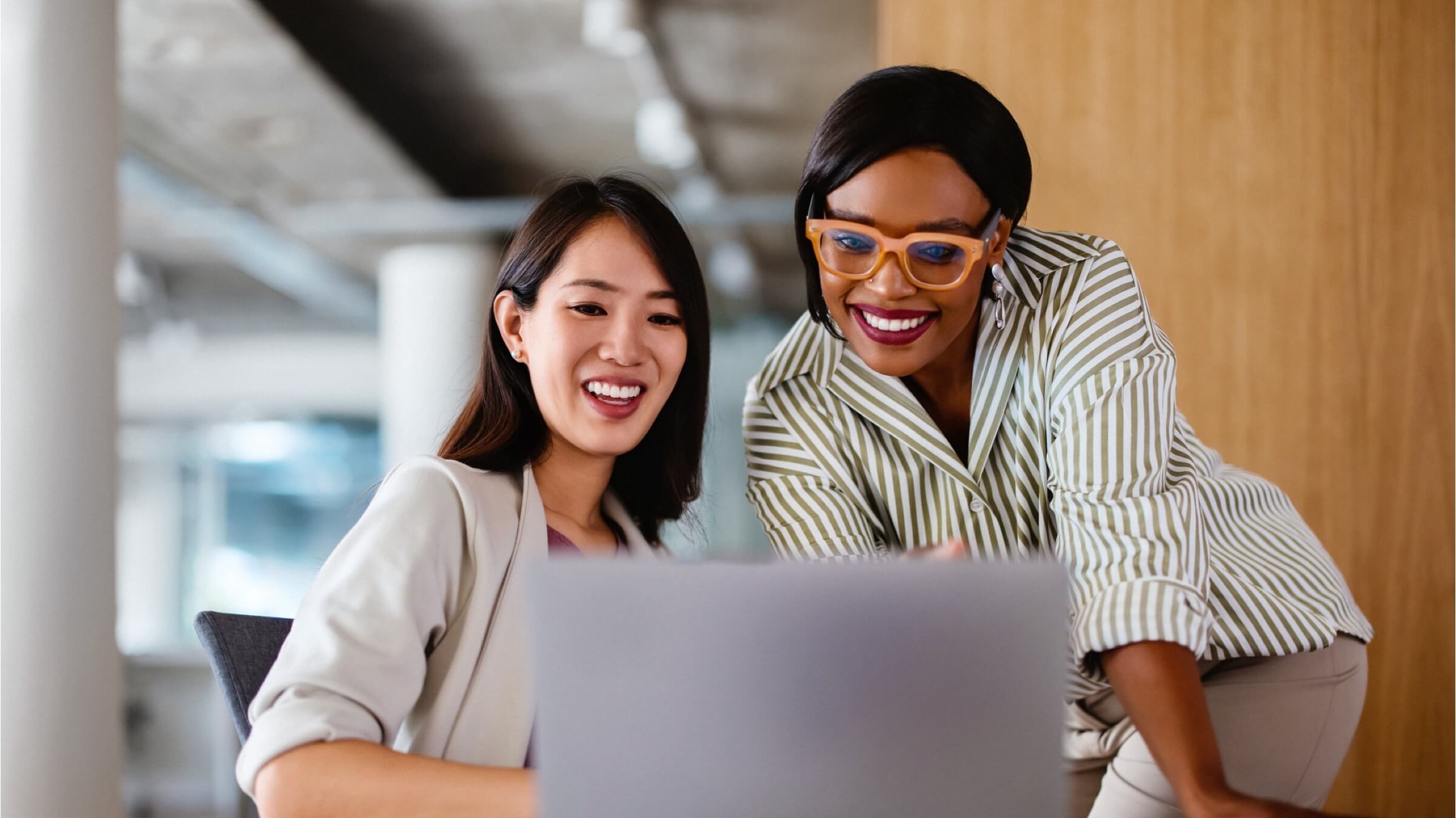 two professional women collaborating header
